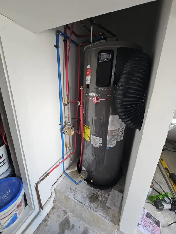 Improperly installed heat pump water heater in Alys Beach FL before correction