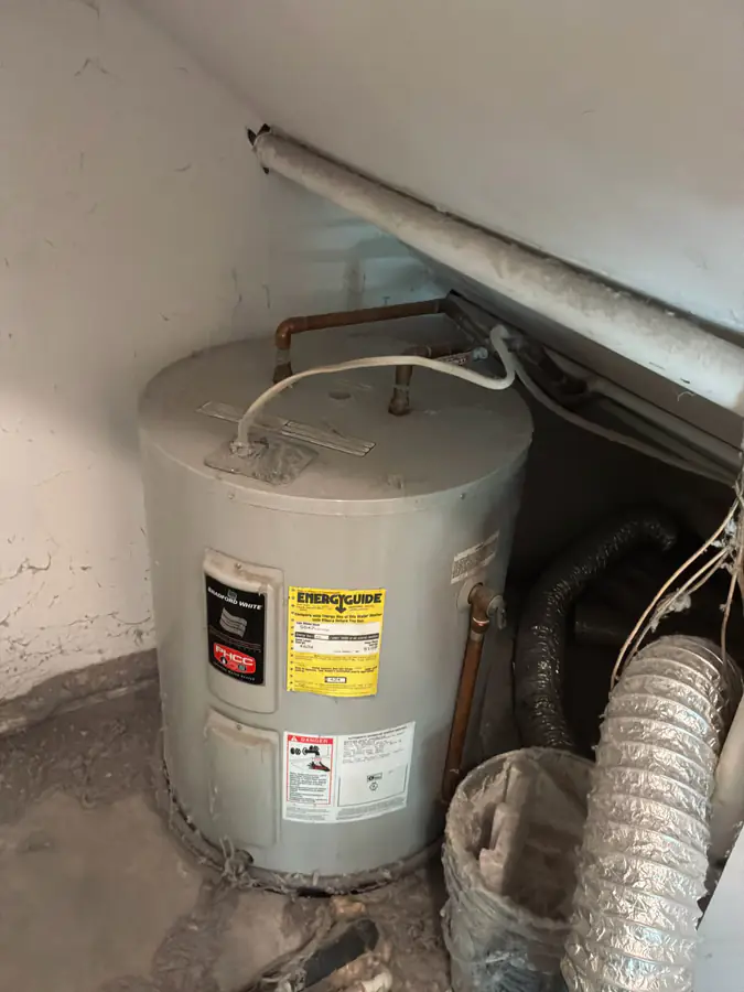Old water heater in Alys Beach FL before replacement