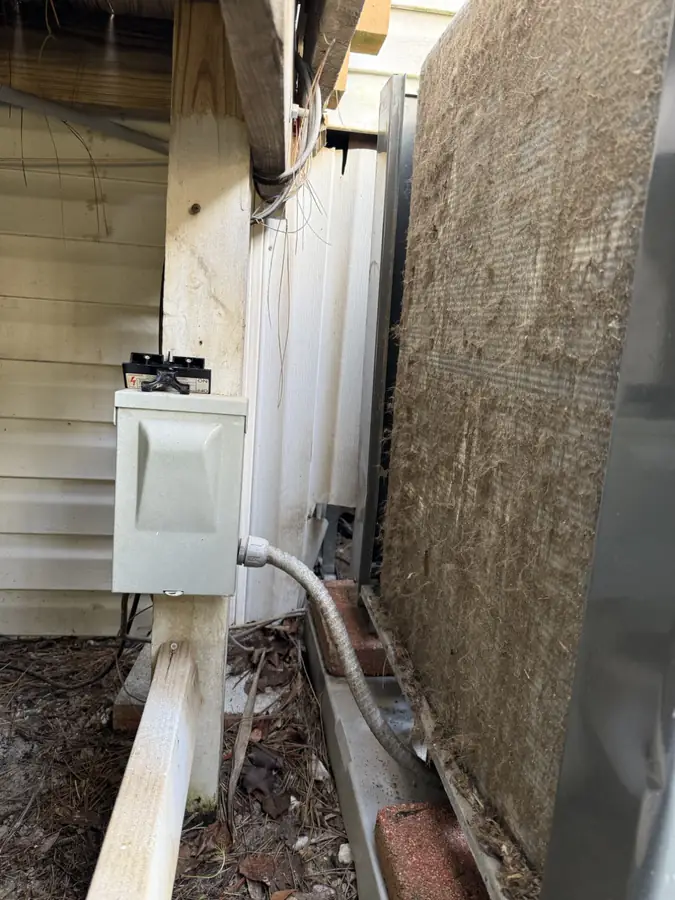 Dirty air conditioner condenser coil in Santa Rosa Beach FL